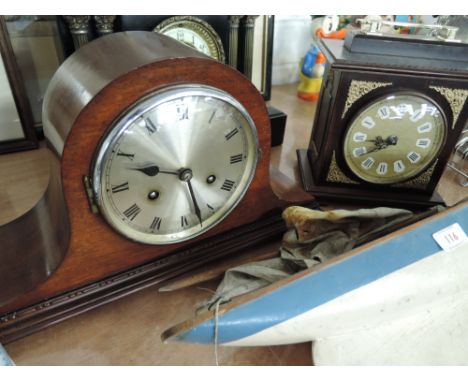 An Edwardian style mantle clock of curved treen body form with chime and other clock