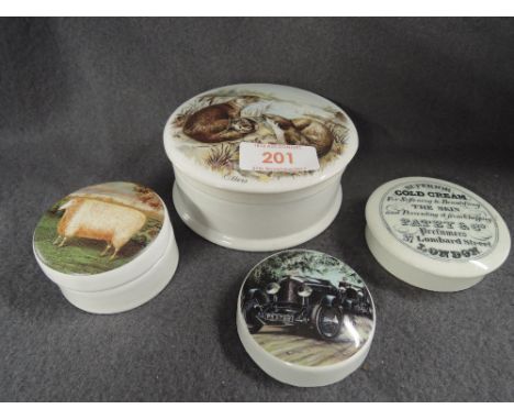 A selection of ceramic trinket boxes including antique cold cream lid