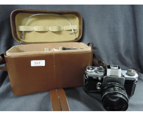 An Edixa-Mat Kadett 35mm camera with filters, lens etc in leather case