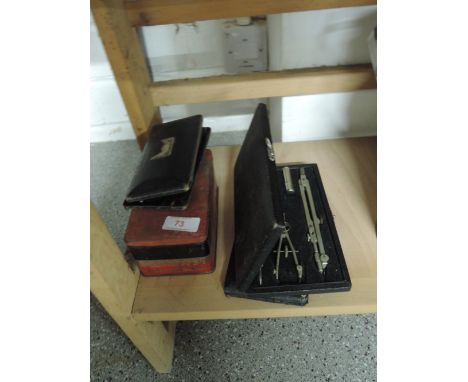 A selection of vintage compass sets for draftsman engineer designers etc