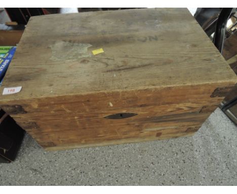 A vintage pine trunk with cast handles and fitments ideal log box etc