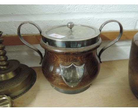 A vintage biscuit barrel of German form with metal handle and ceramic insert