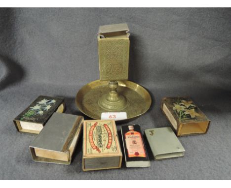 A selection of vintage vesta match stikers and holders including brass machined container