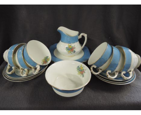 A part dinner tea coffee service by Coalport in a Deco blue and white design