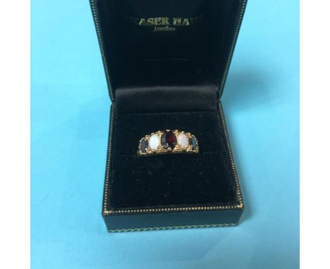 A 9ct gold opal and ruby ring, size R/S, 3.9g 