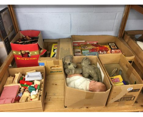 A shelf of toys and games etc.