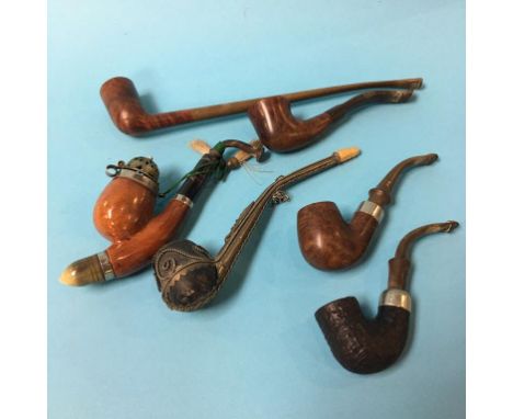 A collection of six pipes, to include Duncan and Pipe Master etc.