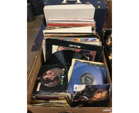 Assorted records and a record player, to include The Jam, The Beatles etc.