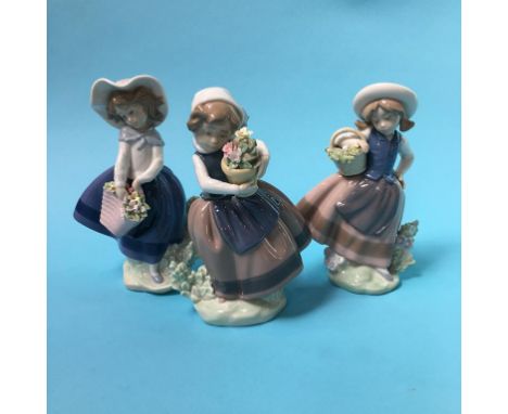 Three small Lladro figures