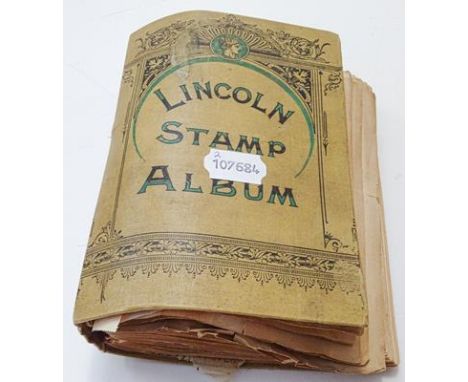 Worldwide, vintage collection in a 19th century Lincoln album containing hundreds of early stamps, the album binding sufferin