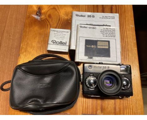 A Rollei 35S camera with case and instructions
