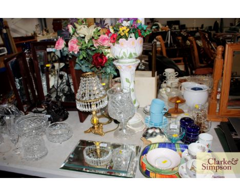 A jardinière on stand and contents of artificial flowers, a cut glass table lamp etc.