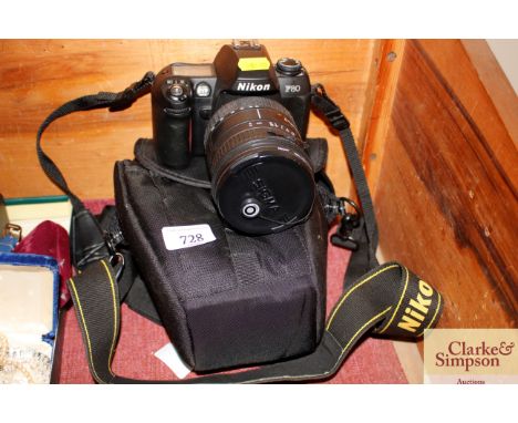 A Nikon F80 camera with carry bag
