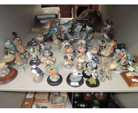 A selection of vintage bird figures