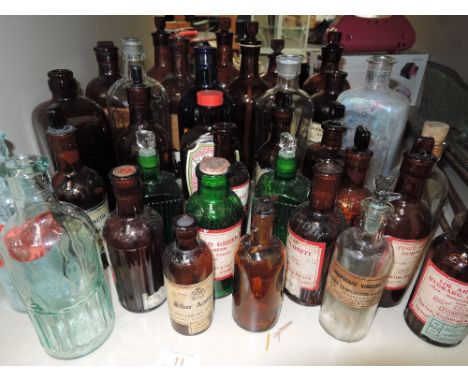 A selection of vintage glass apothecary jars, mixed and various, labelled