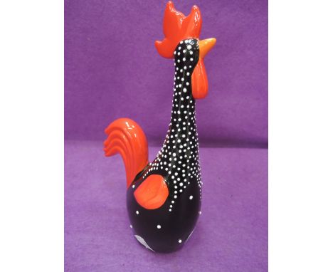 A vintage chicken figure