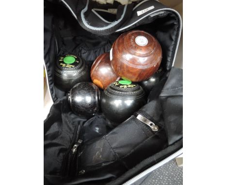 A selection of vintage crown green bowls 