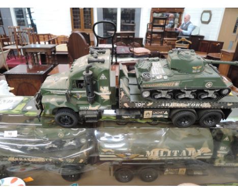 A vintage Land adventure army truck toy