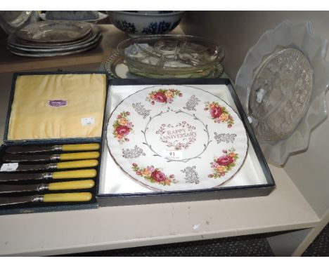 A selection of vintage decorations and fruit knife set