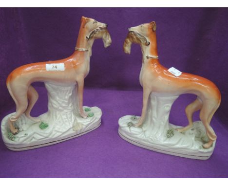 A pair of vintage Staffordshire flat back grey hound style dog figures one AF