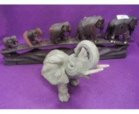 A vintage African elephant herd hand carved and similar