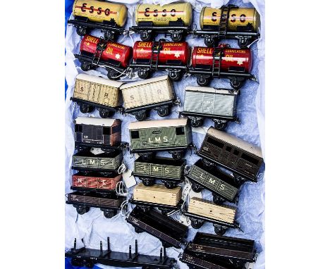 Unboxed Trix Twin 00 gauge pre-war freight rolling stock, including Esso tanks (3), Shell tanks (3), box vans (3), Brake vans