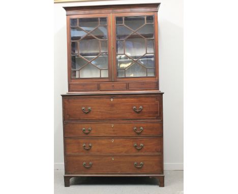 EARLY 19TH CENTURY MAHOGANY SECRETAIRE BOOKCASE, a marriage, the bookcase top in two sections with moulded cornice over a pai