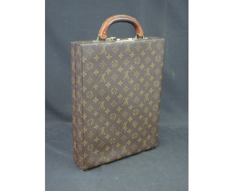 A LOUIS VUITTON SMALL PRINTED LEATHER ATTACHE CASE with fitted interior having impressed stamp: 'Louis Vuitton, Paris, made i