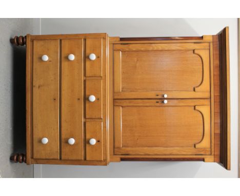 LATE 19TH CENTURY WELSH PALE OAK AND MAHOGANY TWO STAGE PRESS CUPBOARD, having a moulded cornice over two arch panel blind do