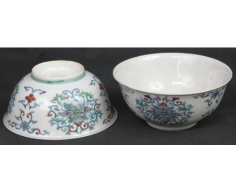 PAIR OF CHINESE PORCELAIN DOUCAI STYLE BOWLS decorated externally in coloured enamels with stylised flower heads and scroll w