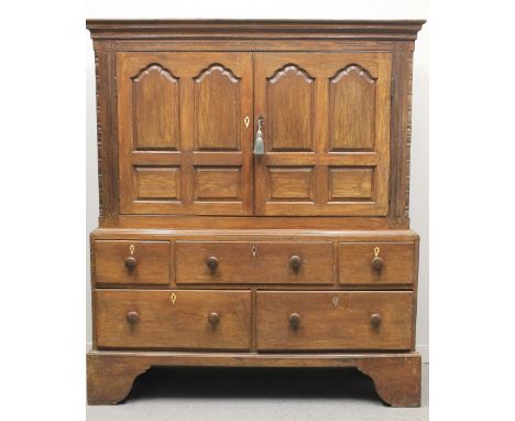 EARLY 19TH CENTURY WELSH OAK TWO STAGE PRESS CUPBOARD having moulded cornice over inlaid frieze with two ogee blind panelled 