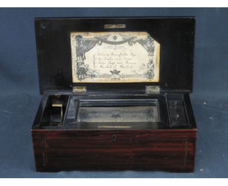 SMALL 19TH CENTURY SWISS MUSICAL BOX having ebonised and foliate inlaid case, playing four airs on a 4.5" steel cylinder.  No