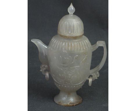 SMALL CHINESE CARVED JADE, LIDDED, OVOID EWER, the lid with pointed baluster finial and fluted decoration, the body with flut