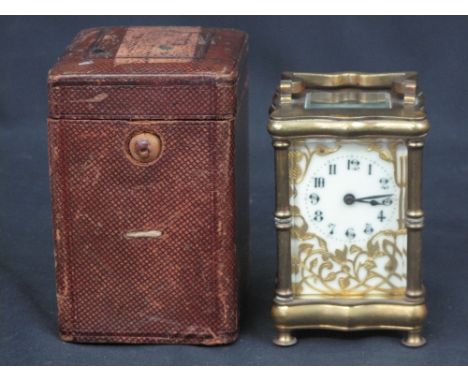 LATE 19TH CENTURY FRENCH BRASS CARRIAGE CLOCK having full depth enamel face with overlaid tracery within a serpentine gorge c