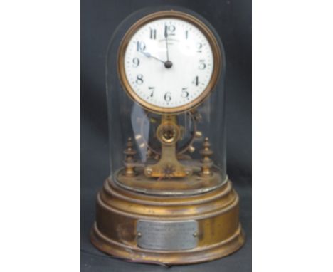 EARLY 20TH CENTURY ELECTRIC CLOCK by the Eureka Clock Company of London, having gilded metal base with Military presentation 