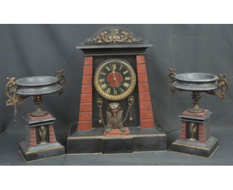 LATE 19TH CENTURY EGYPTIAN STYLE BLACK SLATE AND MARBLE ARCHITECTURAL CLOCK GARNITURE, the clock with applied gilt metal Sphy