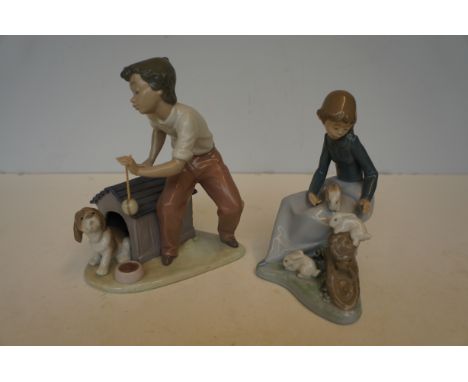 Lladro Figurine 'Boy with Pup' together with a Nao Figurine 'Child with Rabbits'