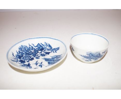 A First Period Worcester porcelain teabowland saucer, decorated in the Fence Pattern,each bearing the crescent moon mark toba