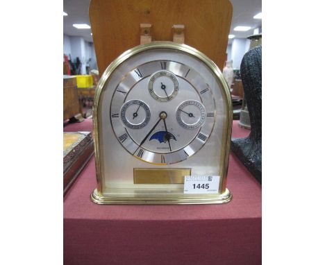 Bucherer Moon Faced Mantle Clock, with three subsidiary dials, in brass casing, 16cn high.Yes marked hermile quartz to back, 