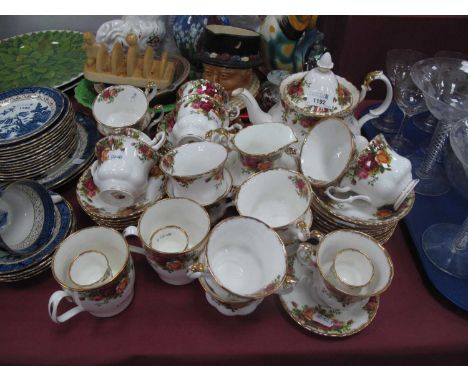 Royal Albert Old Country Roses part tea service, mostly firsts, comprising of teapot, teacups, saucers, sugar, milk jug, egg 