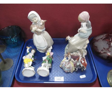 Lladro and Nao Figurines, continental regency courting couple and two individual figures:- One Tray.