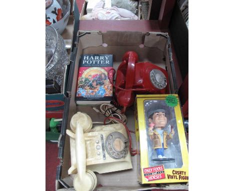 Harry Potter and the Deathly Hallows 1st edition hardback, two vintage telephones and a only fools and horses vinyl figure. 1