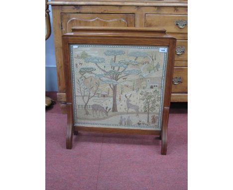 Edwardian Inlaid Mahogany Firescreen, with needlework on silk panel, featuring churches, trees, stags and figures, 68cm wide