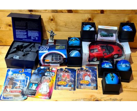 A mixed box containing diecast Corgi James Bond vehicle, various Star Wars figures, Royal Hampshire Art Foundry cast figure, 