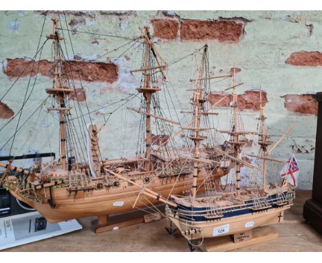 Two wooden model masted ships. 