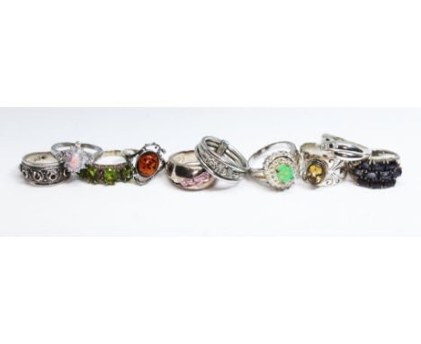 A group of ten rings, nine marked '925' and another unmarked, various settings, gross wt. 44.96g, size L-R. 