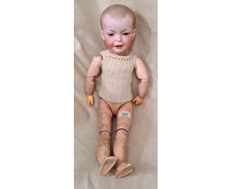 An antique S.F.B.J articulated doll with bisque head, open eyes, model 226, size 8.Condition:- General wear through age, some