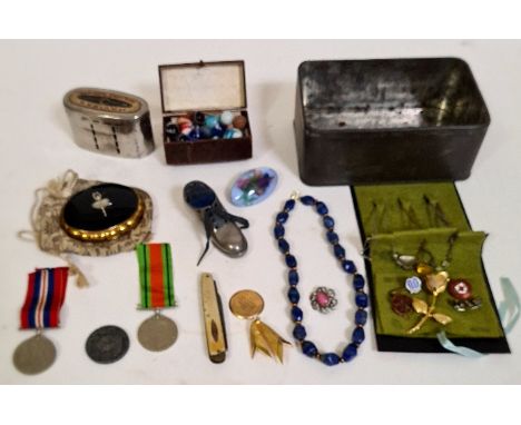 A box of collectables to include a Halifax money bank, a pin cusion in shoe, vintage marbles, 9c gold watch back, various med