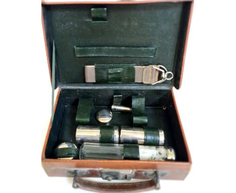 A vintage gentleman's grooming kit in leather case - incomplete. 