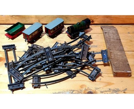 An 0 gauge clockwork model train set. 